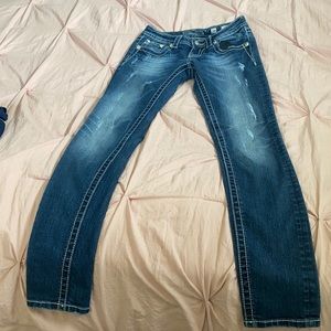 Women’s miss me ripped jeans